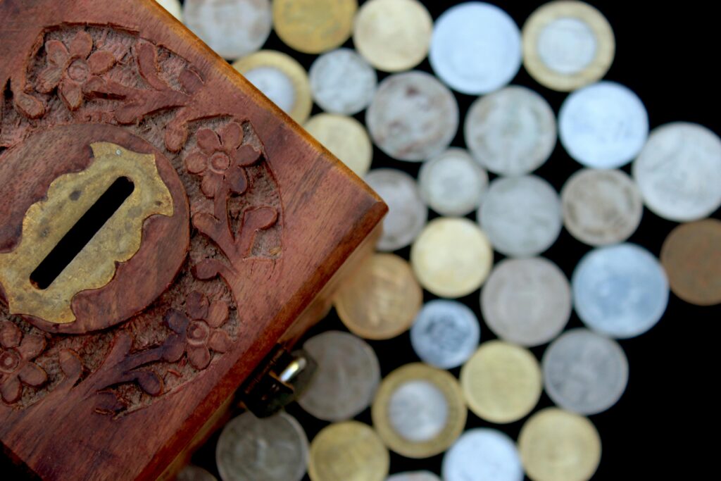 Brown Wooden Box With Silver Round Coins